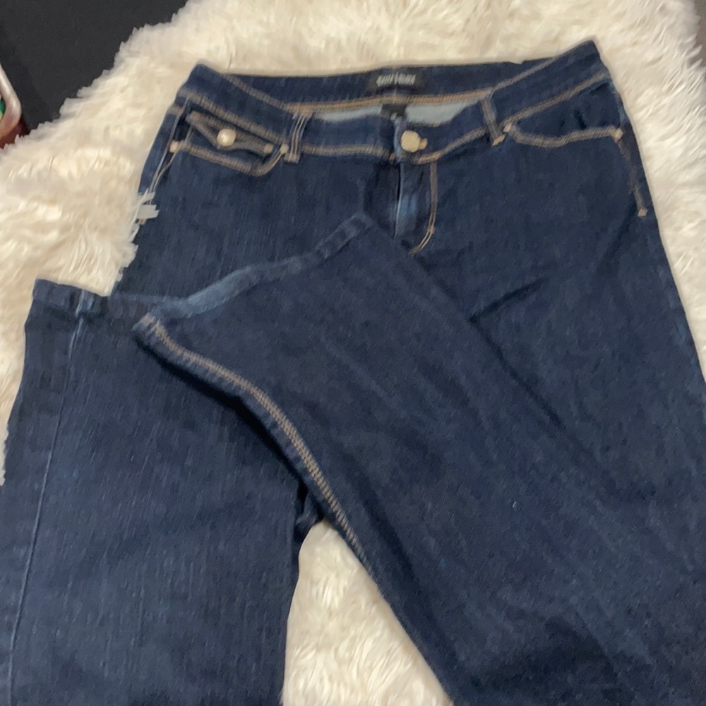 Like new White House Black Market jeans. Dark blue with flare bottoms